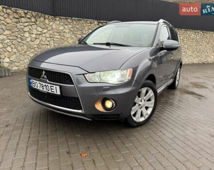 Серый Мицубиси Аутлендер, объемом двигателя 2.2 л и пробегом 230 тыс. км за 11000 $, фото 1 на Automoto.ua