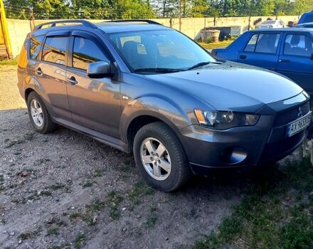 Серый Мицубиси Аутлендер, объемом двигателя 2.4 л и пробегом 154 тыс. км за 10000 $, фото 1 на Automoto.ua