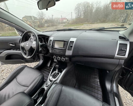 Серый Мицубиси Аутлендер, объемом двигателя 2.2 л и пробегом 289 тыс. км за 11300 $, фото 66 на Automoto.ua