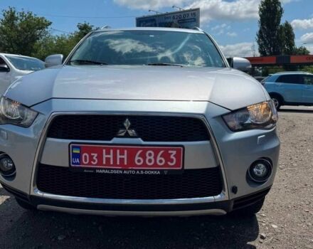 Серый Мицубиси Аутлендер, объемом двигателя 2.1 л и пробегом 225 тыс. км за 11500 $, фото 3 на Automoto.ua