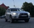 Серый Мицубиси Аутлендер, объемом двигателя 2 л и пробегом 179 тыс. км за 10000 $, фото 1 на Automoto.ua