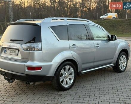 Серый Мицубиси Аутлендер, объемом двигателя 2.18 л и пробегом 294 тыс. км за 10799 $, фото 3 на Automoto.ua