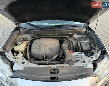 Серый Мицубиси Аутлендер, объемом двигателя 2.18 л и пробегом 294 тыс. км за 10799 $, фото 21 на Automoto.ua