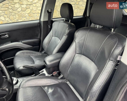 Серый Мицубиси Аутлендер, объемом двигателя 2.2 л и пробегом 230 тыс. км за 11000 $, фото 20 на Automoto.ua