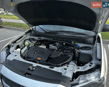Мицубиси Аутлендер 2010 в Белой Церкве на Automoto.ua Серый Мицубиси Аутлендер, объемом двигателя 2.36 л и пробегом 220 тыс. км за 9000 $, фото 12 на Automoto.ua
