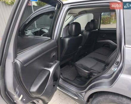 Серый Мицубиси Аутлендер, объемом двигателя 2.3 л и пробегом 263 тыс. км за 11400 $, фото 9 на Automoto.ua