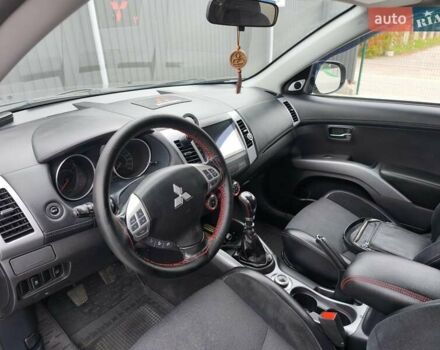 Серый Мицубиси Аутлендер, объемом двигателя 2.3 л и пробегом 263 тыс. км за 11400 $, фото 6 на Automoto.ua