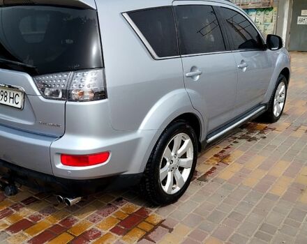Мицубиси Аутлендер 2010 в Великой Александровке на Automoto.ua Серый Мицубиси Аутлендер, объемом двигателя 2.2 л и пробегом 300 тыс. км за 12000 $, фото 2 на Automoto.ua