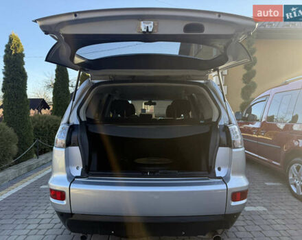 Серый Мицубиси Аутлендер, объемом двигателя 2.4 л и пробегом 218 тыс. км за 9950 $, фото 14 на Automoto.ua