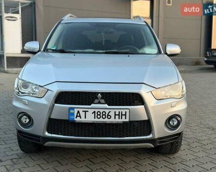 Серый Мицубиси Аутлендер, объемом двигателя 2.18 л и пробегом 294 тыс. км за 10799 $, фото 2 на Automoto.ua