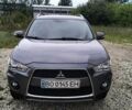 Серый Мицубиси Аутлендер, объемом двигателя 2.4 л и пробегом 271 тыс. км за 10300 $, фото 1 на Automoto.ua
