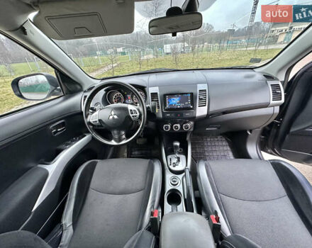 Серый Мицубиси Аутлендер, объемом двигателя 2.4 л и пробегом 270 тыс. км за 8450 $, фото 12 на Automoto.ua