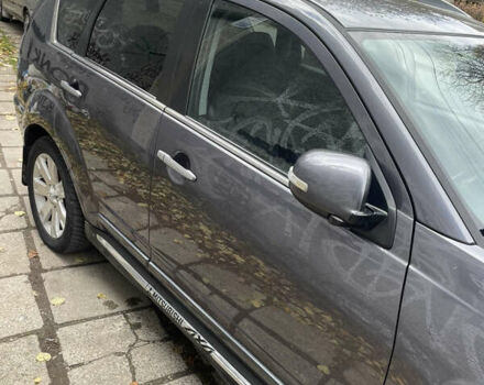 Серый Мицубиси Аутлендер, объемом двигателя 2 л и пробегом 264 тыс. км за 9500 $, фото 4 на Automoto.ua