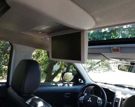 Серый Мицубиси Аутлендер, объемом двигателя 2.4 л и пробегом 151 тыс. км за 11100 $, фото 4 на Automoto.ua