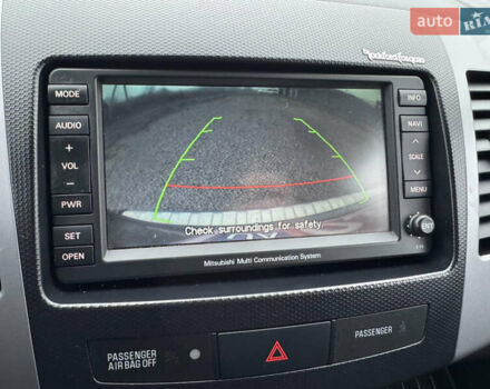 Серый Мицубиси Аутлендер, объемом двигателя 2.2 л и пробегом 289 тыс. км за 11300 $, фото 76 на Automoto.ua