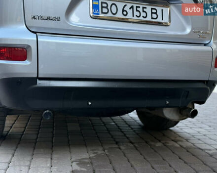 Серый Мицубиси Аутлендер, объемом двигателя 2.4 л и пробегом 218 тыс. км за 9950 $, фото 28 на Automoto.ua