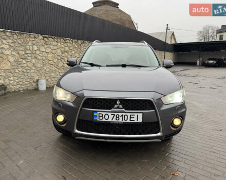 Серый Мицубиси Аутлендер, объемом двигателя 2.2 л и пробегом 230 тыс. км за 11000 $, фото 2 на Automoto.ua