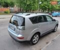 Серый Мицубиси Аутлендер, объемом двигателя 2.36 л и пробегом 205 тыс. км за 9250 $, фото 4 на Automoto.ua