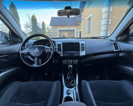 Серый Мицубиси Аутлендер, объемом двигателя 2.4 л и пробегом 218 тыс. км за 9950 $, фото 13 на Automoto.ua