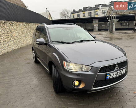 Серый Мицубиси Аутлендер, объемом двигателя 2.2 л и пробегом 230 тыс. км за 11000 $, фото 3 на Automoto.ua