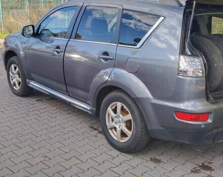 Серый Мицубиси Аутлендер, объемом двигателя 2.3 л и пробегом 294 тыс. км за 9600 $, фото 14 на Automoto.ua