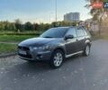 Серый Мицубиси Аутлендер, объемом двигателя 2.4 л и пробегом 321 тыс. км за 9000 $, фото 1 на Automoto.ua
