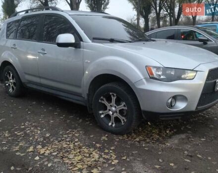 Серый Мицубиси Аутлендер, объемом двигателя 2 л и пробегом 205 тыс. км за 9600 $, фото 7 на Automoto.ua