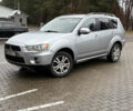 Серый Мицубиси Аутлендер, объемом двигателя 2.18 л и пробегом 233 тыс. км за 11000 $, фото 1 на Automoto.ua