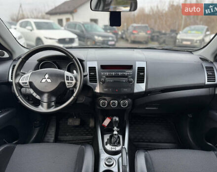 Серый Мицубиси Аутлендер, объемом двигателя 2.2 л и пробегом 211 тыс. км за 11999 $, фото 26 на Automoto.ua