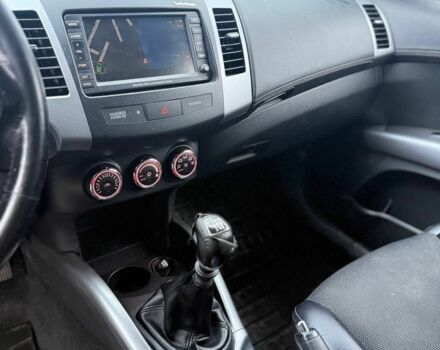 Серый Мицубиси Аутлендер, объемом двигателя 2.3 л и пробегом 279 тыс. км за 4642 $, фото 9 на Automoto.ua