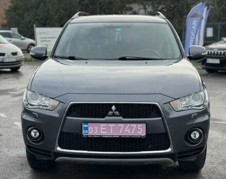 Серый Мицубиси Аутлендер, объемом двигателя 2.2 л и пробегом 211 тыс. км за 11999 $, фото 1 на Automoto.ua