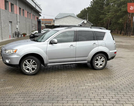 Серый Мицубиси Аутлендер, объемом двигателя 2.18 л и пробегом 233 тыс. км за 11000 $, фото 2 на Automoto.ua