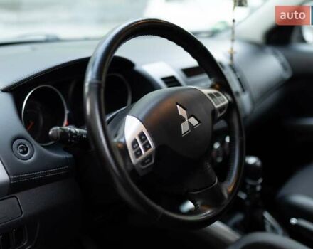 Серый Мицубиси Аутлендер, объемом двигателя 2.27 л и пробегом 291 тыс. км за 9700 $, фото 26 на Automoto.ua