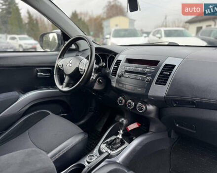 Серый Мицубиси Аутлендер, объемом двигателя 2.2 л и пробегом 211 тыс. км за 11999 $, фото 22 на Automoto.ua