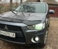 Серый Мицубиси Аутлендер, объемом двигателя 2.36 л и пробегом 190 тыс. км за 10499 $, фото 4 на Automoto.ua