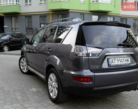 Серый Мицубиси Аутлендер, объемом двигателя 2.27 л и пробегом 291 тыс. км за 9700 $, фото 22 на Automoto.ua