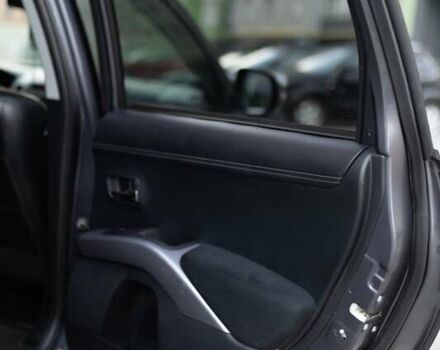 Серый Мицубиси Аутлендер, объемом двигателя 2.27 л и пробегом 291 тыс. км за 9700 $, фото 12 на Automoto.ua