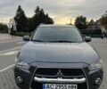 Серый Мицубиси Аутлендер, объемом двигателя 2.2 л и пробегом 220 тыс. км за 10999 $, фото 1 на Automoto.ua