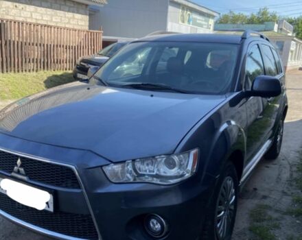 Серый Мицубиси Аутлендер, объемом двигателя 2.2 л и пробегом 240 тыс. км за 10500 $, фото 1 на Automoto.ua