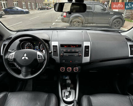 Серый Мицубиси Аутлендер, объемом двигателя 2.4 л и пробегом 226 тыс. км за 10200 $, фото 25 на Automoto.ua