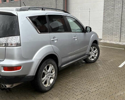 Серый Мицубиси Аутлендер, объемом двигателя 2.18 л и пробегом 233 тыс. км за 11000 $, фото 7 на Automoto.ua