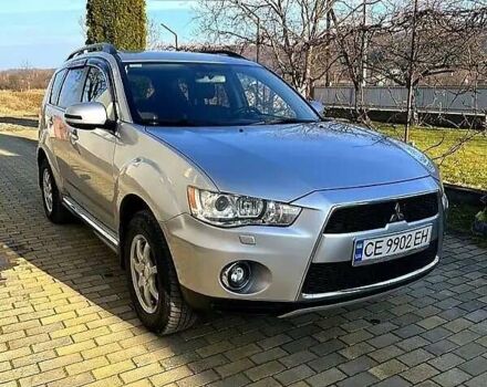 Серый Мицубиси Аутлендер, объемом двигателя 2.2 л и пробегом 248 тыс. км за 11000 $, фото 1 на Automoto.ua