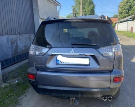 Серый Мицубиси Аутлендер, объемом двигателя 2.2 л и пробегом 240 тыс. км за 10500 $, фото 2 на Automoto.ua
