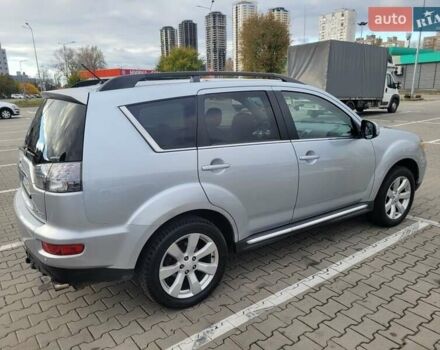Серый Мицубиси Аутлендер, объемом двигателя 2.2 л и пробегом 175 тыс. км за 10999 $, фото 1 на Automoto.ua