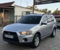 Серый Мицубиси Аутлендер, объемом двигателя 2.4 л и пробегом 188 тыс. км за 10999 $, фото 1 на Automoto.ua