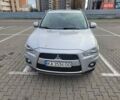 Серый Мицубиси Аутлендер, объемом двигателя 2.2 л и пробегом 175 тыс. км за 10999 $, фото 23 на Automoto.ua