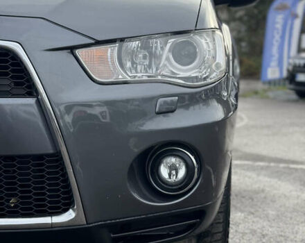 Серый Мицубиси Аутлендер, объемом двигателя 2.2 л и пробегом 211 тыс. км за 11999 $, фото 10 на Automoto.ua