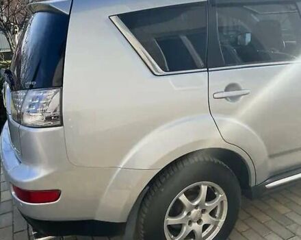 Серый Мицубиси Аутлендер, объемом двигателя 2.2 л и пробегом 248 тыс. км за 11000 $, фото 14 на Automoto.ua