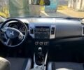 Серый Мицубиси Аутлендер, объемом двигателя 2.2 л и пробегом 248 тыс. км за 11000 $, фото 4 на Automoto.ua