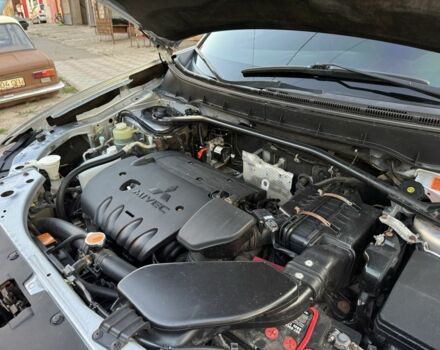 Серый Мицубиси Аутлендер, объемом двигателя 2.4 л и пробегом 188 тыс. км за 10999 $, фото 21 на Automoto.ua